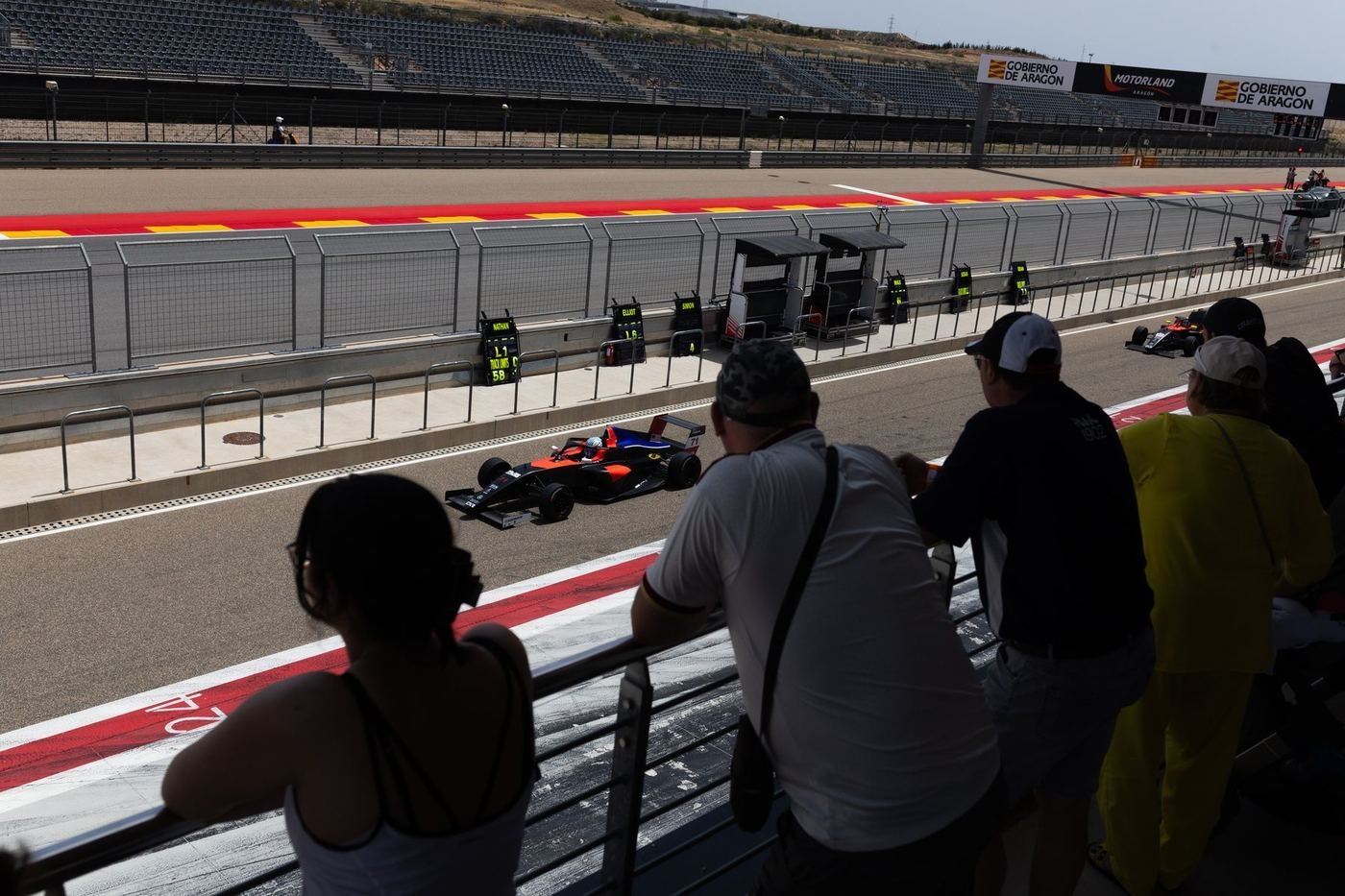 Spectators trackside at Motorland during a DXR test session